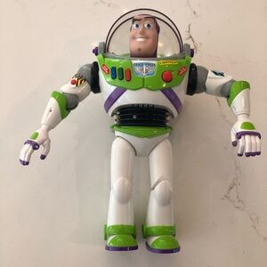 Buzz Lightyear interactive talking action figure from the Disney-Pixar 13”